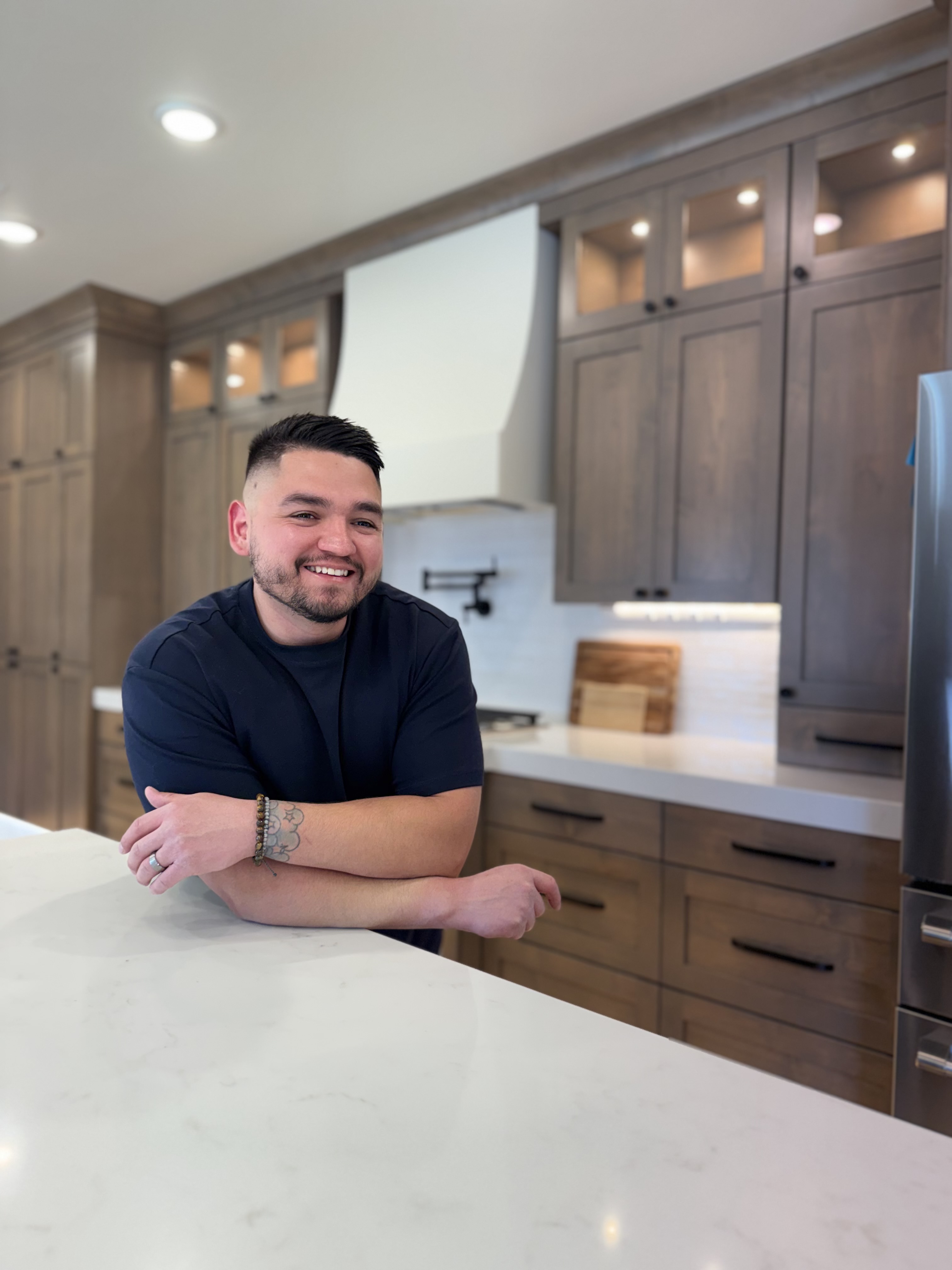 Carlos Soto, Cedar City REALTOR and ChicProClean founder, in a kitchen